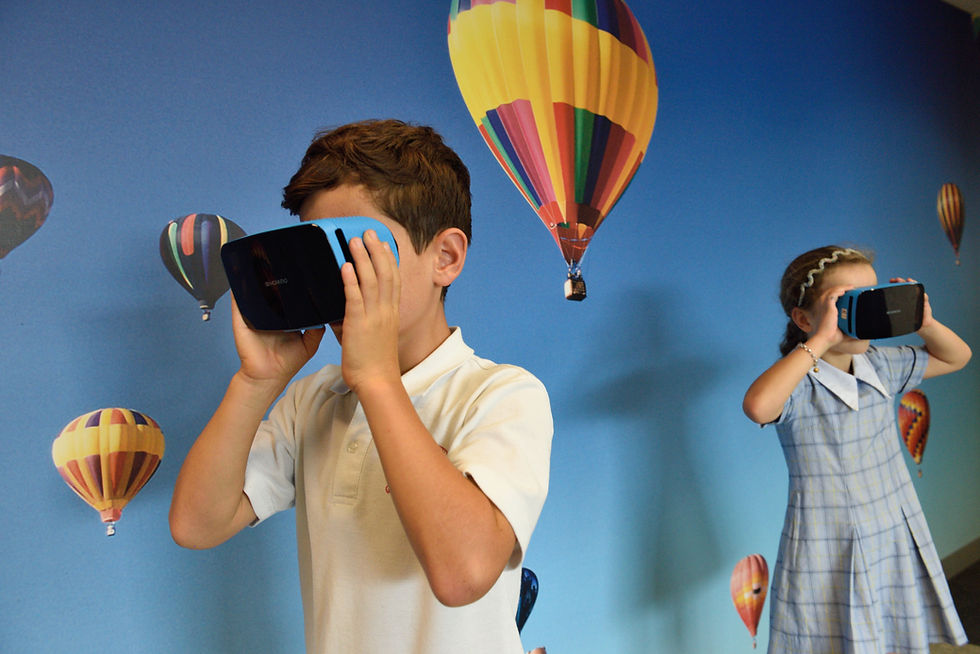 Kids looking through goggles