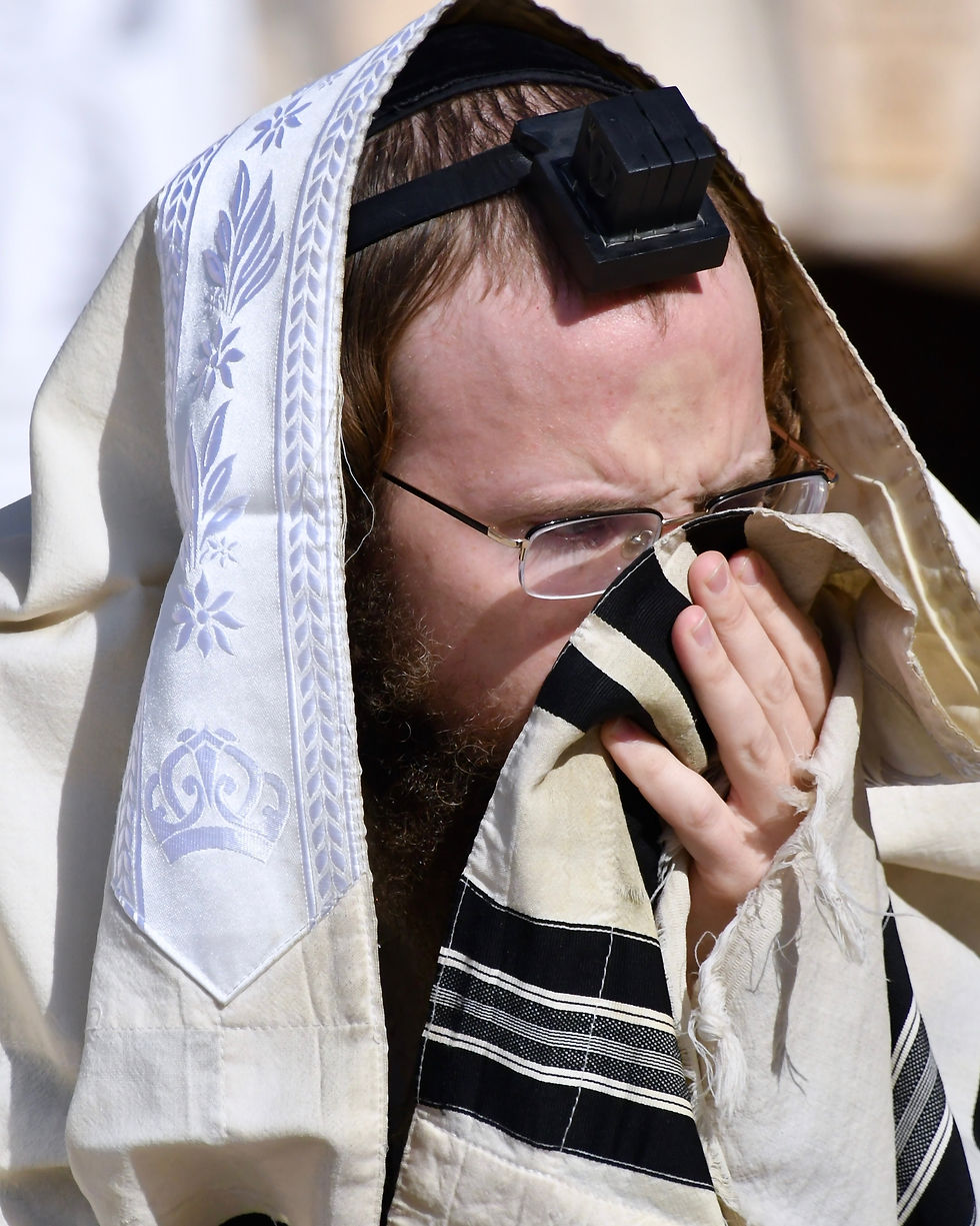 Jewish man Phylactery, prayer shawl crying