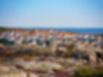 Swedish village on island on Sweden's west coast, with white buildings in wood