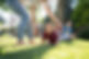 Baby crawling in grass