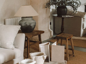 Beautiful grounding living room with warm Earth element Feng Shui colors, natural textures, and cozy decor.