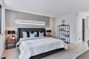 Master bedroom with LED light fixture and electric interior design in South Portland, Maine