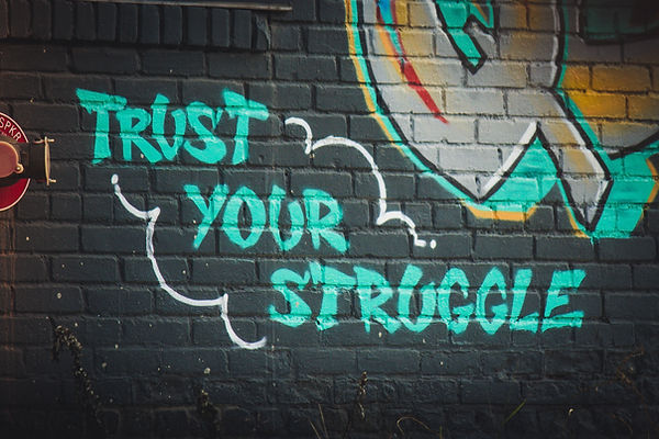 Image of spray paint about trusting your own feelings