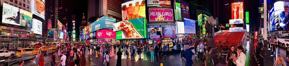 Various types of digital signage advertisements in Times Square, New York.