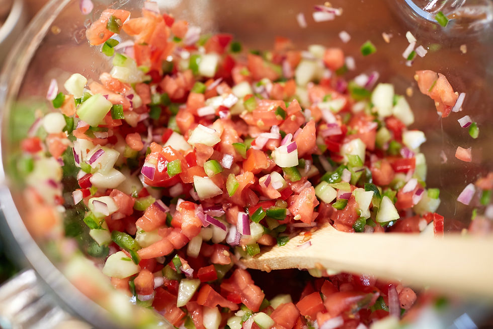 High angle view of a colorful homemade salsa with diced vegetables