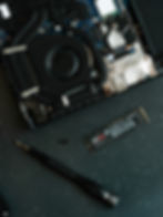 Laptop repair: SSD upgrade, screwdriver nearby