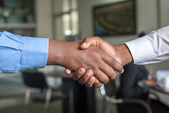 Image by Cytonn Photograph of a business handshakey
