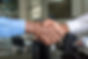 Image by Cytonn Photograph of two men shaking handsy