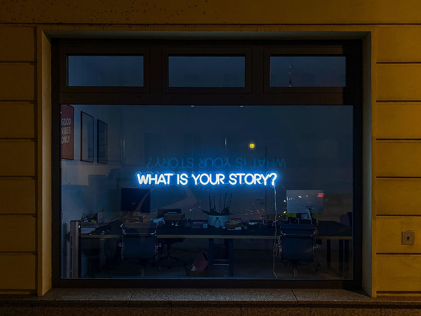 A theatre screen with “Write Your Story” in bold text, symbolising conscious authorship.