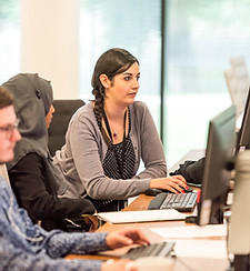 Men and women volunteering remotely on their computers