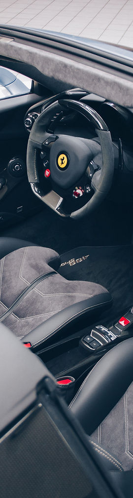 Interior of a Ferrari professionally cleaned with mobile detailing in Brisbane by Auto Shine QLD