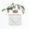 envelope, leaves, pen and crystal