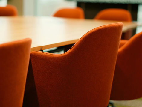 Modern boardroom with conference table and chairs