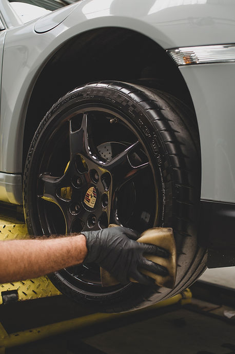 Detailed car wheel and brake rotor after exterior detailing in Delta