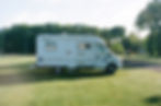 White motorhome parked outdoors