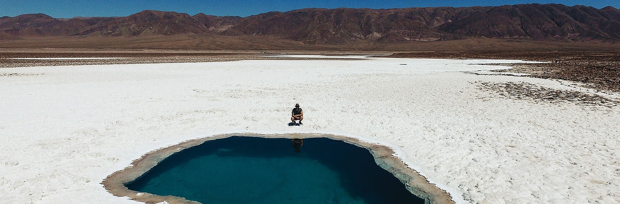 Crystal-clear salt lakes in Siwa Oasis reflecting the sky, a hidden natural wonder in Egypt's Western Desert