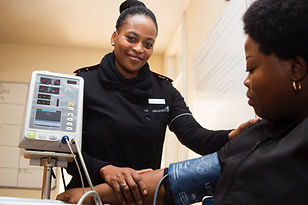 Nurse measuring blood preassure