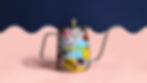 A metal watering can decorated with vibrant, playful stickers and brand-style illustrations, placed against a colorful wavy background.