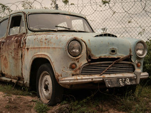 Rusted car undercarriage showing why cars rust Pennsylvania faster than other states
