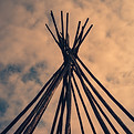 Teepee sticks and skyImage by Ehud Neuhaus