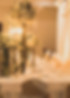 Elegant indoor banquet hall setup with chafing dishes and signage