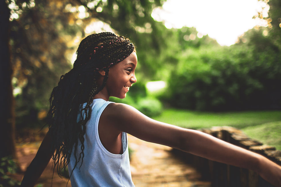 African-American girl smiling while exercising