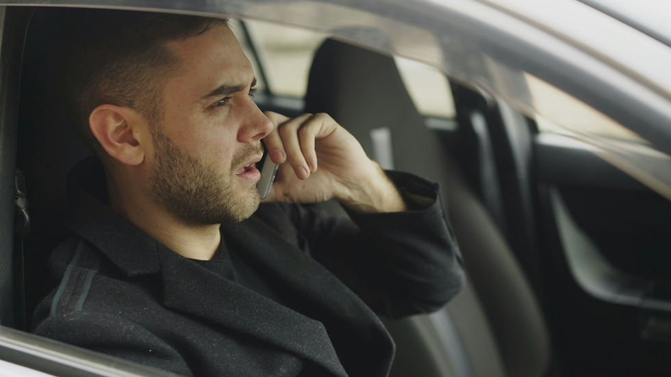 A man talks to a Maryland employment lawyer on the phone after being wrongfully terminated