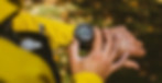 person looking down at running watch