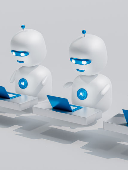 Four identical white 3D robot characters with round heads, blue glowing eyes, and "AI" badges on their chests, each seated at blue laptops in a row against a neutral background—representing artificial intelligence workers or an AI team.