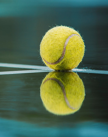 Tennis ball and tennis court