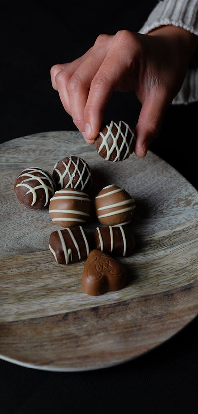Assorted chocolates showcasing chocolate creation party service
