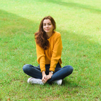 Image of a teen girl sitting on the grass on a sunny day | therapy for teens in new york, ny | therapy for teens in manhattan, ny | therapy for teens in brooklyn, ny | teen therapist | anxiety in teens | 10002 | 11201 | 11215