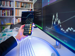 A calculator and a computer screen