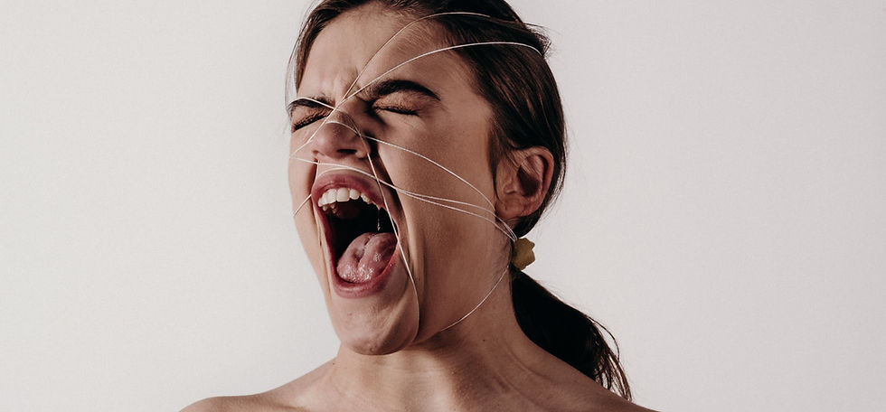 Image by Noah Buscher woman tied up by string phobia scared  screaming