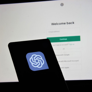 Computer screen displaying the ChatGPT website, featuring an AI chatbot interface.