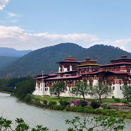Punakha Dzong in Bhutan with scenic mountains and river