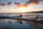 Yoga at sunset on a beach