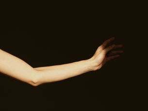 A hand in the darkness