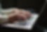 Person Typing on Keyboard