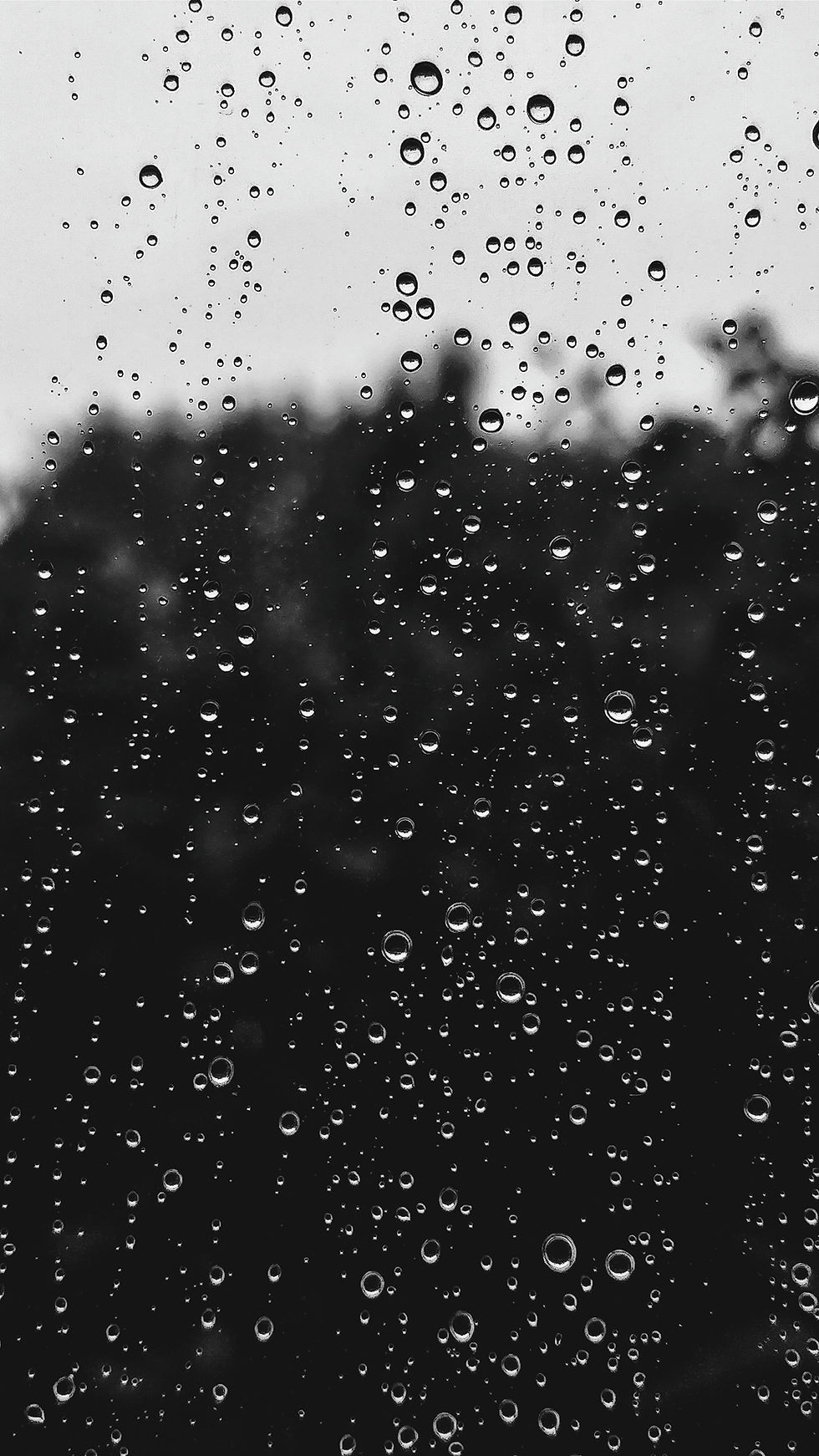 A window with raindrops on it.