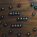 Scrabble tiles spell 'WORK FROM HOME'