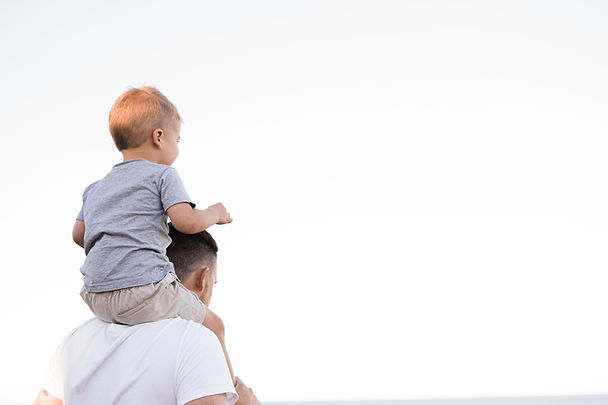 Father and son spending time together after parenting arrangements and child custody has been finalized at TMB LAW