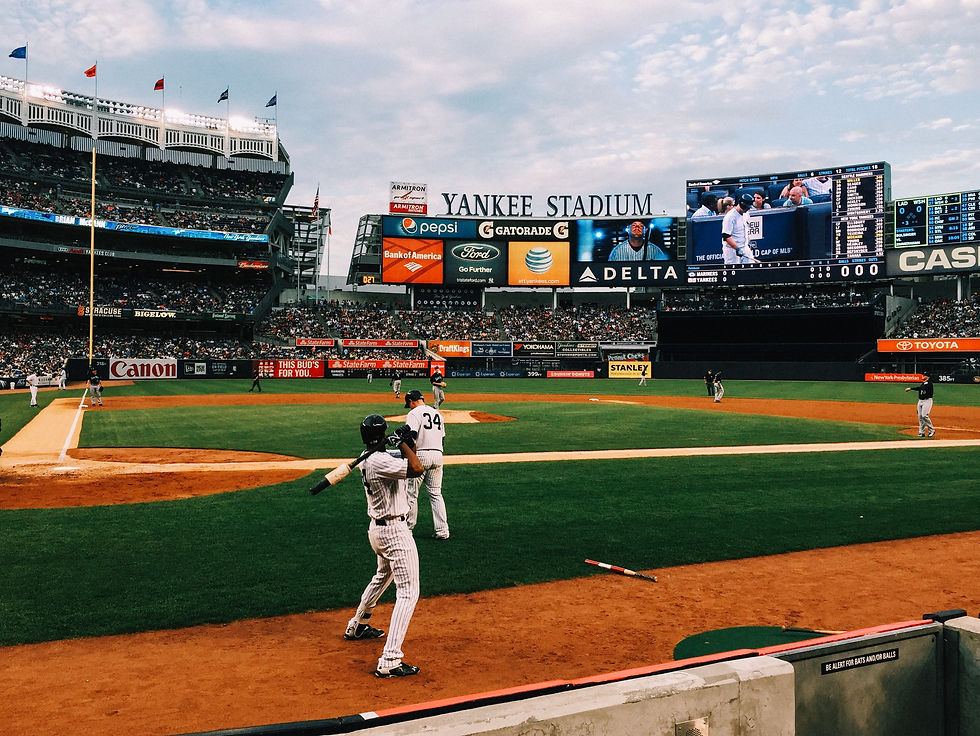 Yankees stadium baseball new york city sports players on field getting ready to bat