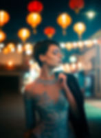 woman in a blue lace dress under lighted lanterns
