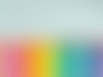 pencil crayons in a rainbow line