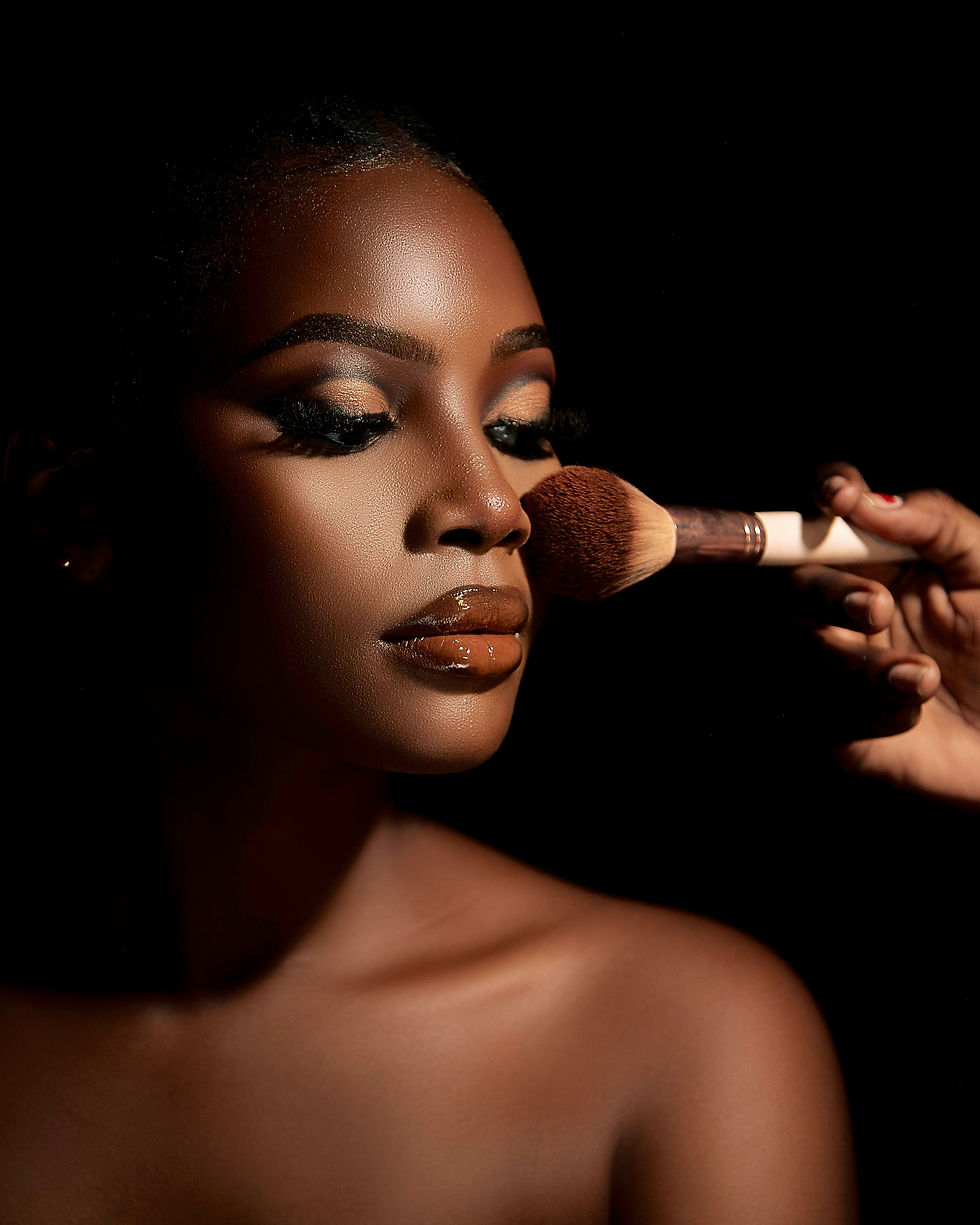 Foundation blended along the cheek with a brush