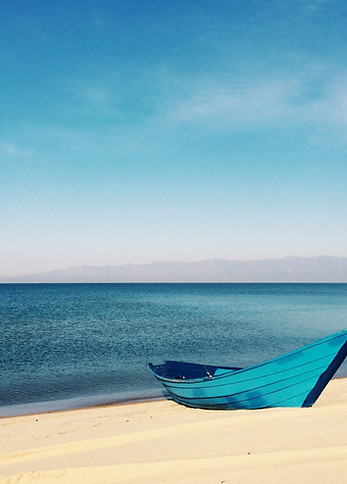 Boat on the shore - unsplash photo credit to the talented Mickey O'neil - thank you!