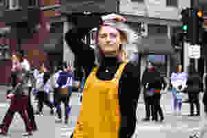 woman confused and standing in the middle of a street