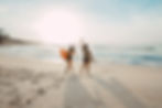 Two people on a sunny beach 