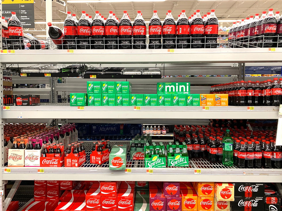 soft drinks on a shelf in a store
